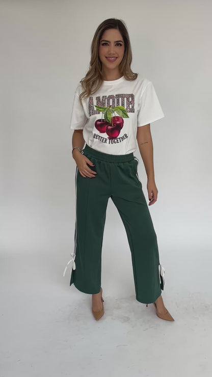 Pants abierta y moño verde